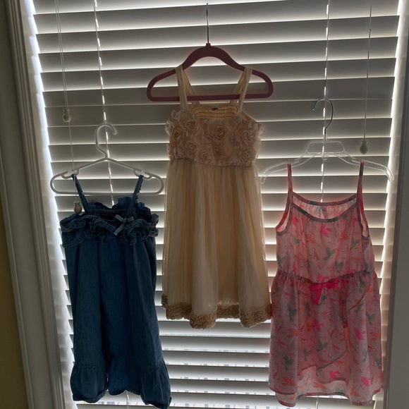 A bundle of 3 5T dresses
